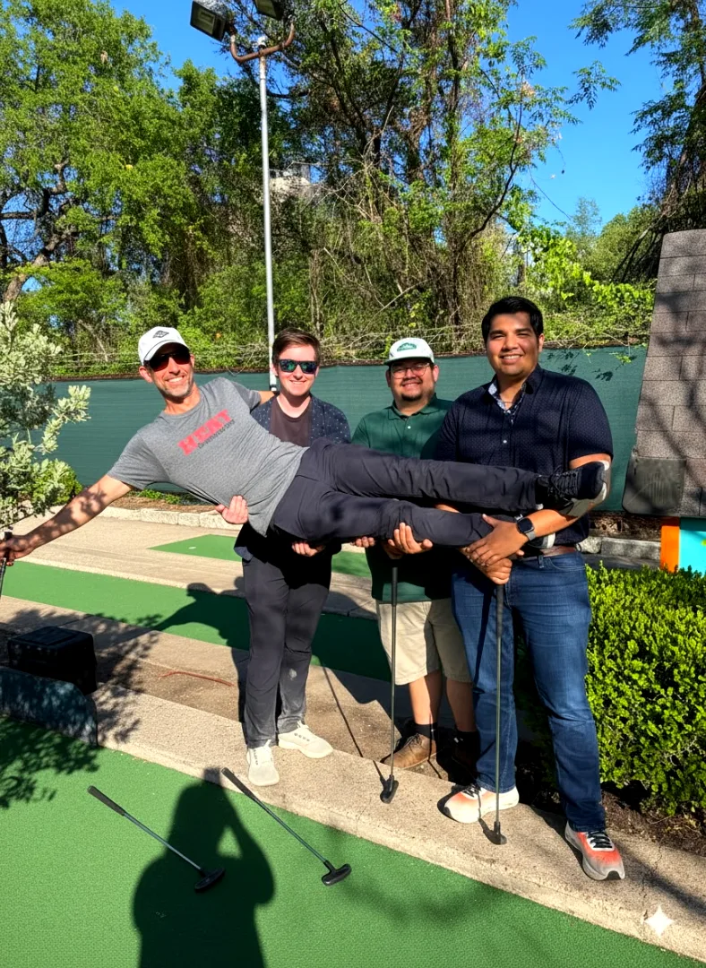 Peter Pan Putt Putt Mahoney Culture - Employees attending a putt putt golf work outing event